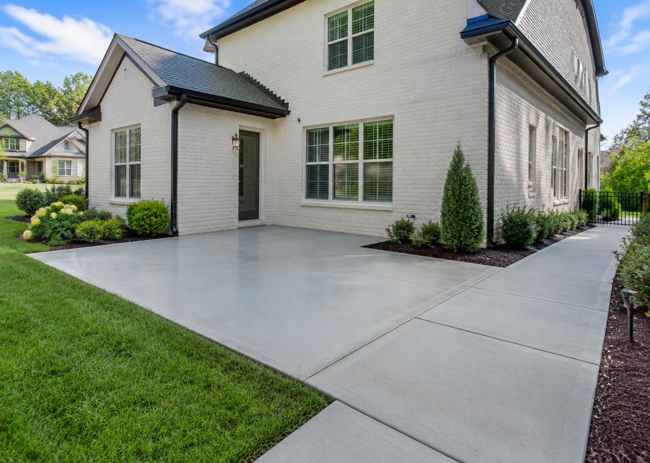 Newly finished residential concrete patio and walkway
