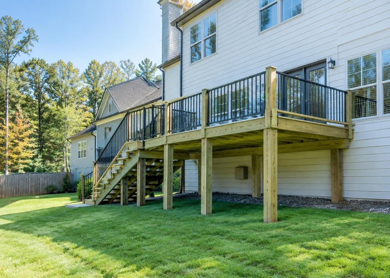 Elevated wood deck with black railings